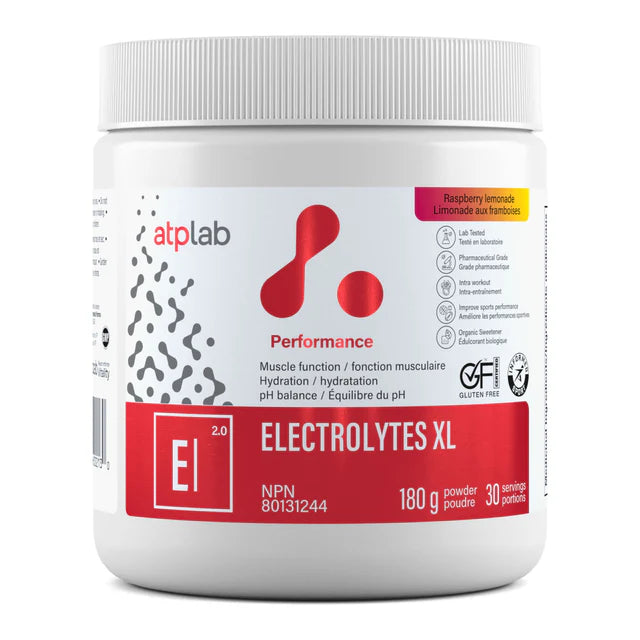 A white plastic tub of atplab Performance Electrolytes XL powder, featuring a red and white label with raspberry lemonade flavor details, on a white background.